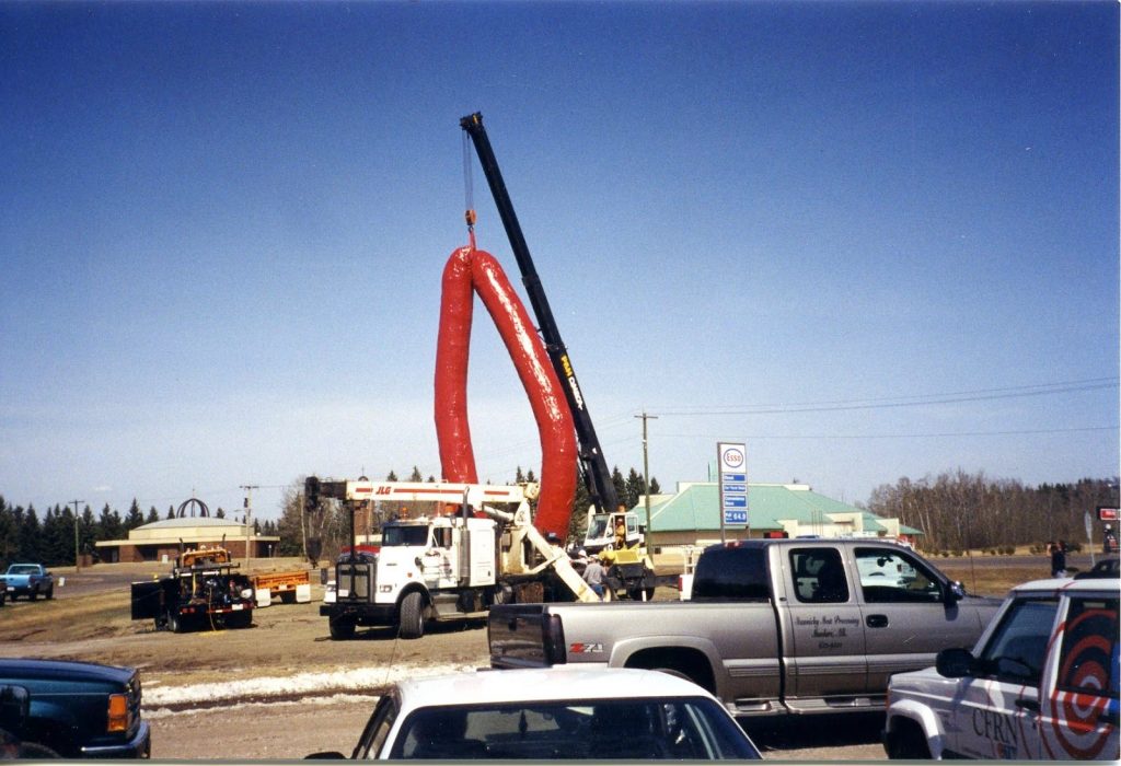 Installing the world's largest sausage in Mundare, Alberta, Canada